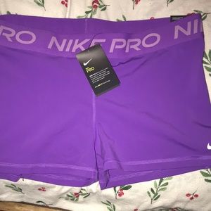 Purple Nike Pros size XXL never worn new with tags